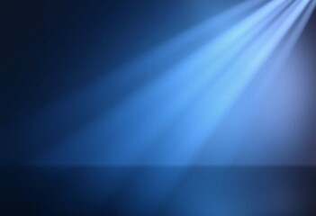 Abstract blue background with soft light beams.