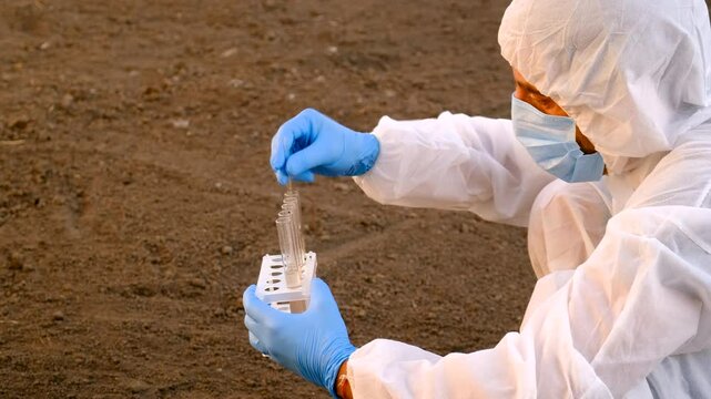 Taking soil samples in nature. Selective focus.