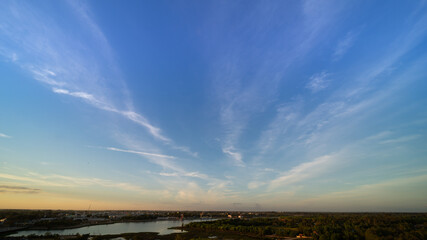 Serene Sky Over a Tranquil River Landscape