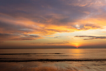 Serene Sunset Over Calm Ocean Waters