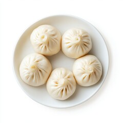 stuffed steamed bun and dim sum on the plate isolated on white background.