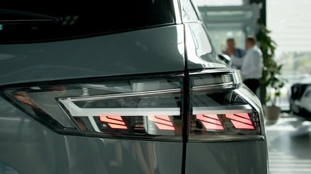 Close-up of advanced car headlight technology in a modern car interior. The sleek design illuminates the road, showcasing innovation and enhancing nighttime visibility.