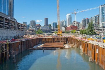 Fototapeta premium Construction Site with City Skyline in the Background