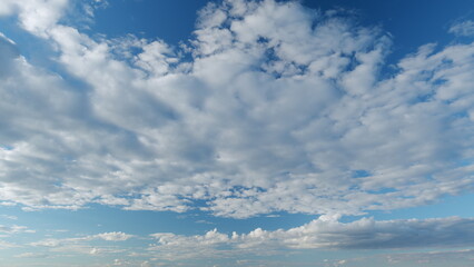 Obraz premium Blue sky with cumulus and cirrocumulus on different layers clouds. Beautiful sky with clouds background. Timelapse.
