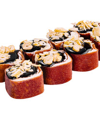 Sweet sushi rolls with peanuts and chocolate sauce lying on white background