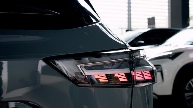 Close-up of advanced car headlight technology in a modern car interior. The sleek design illuminates the road, showcasing innovation and enhancing nighttime visibility.