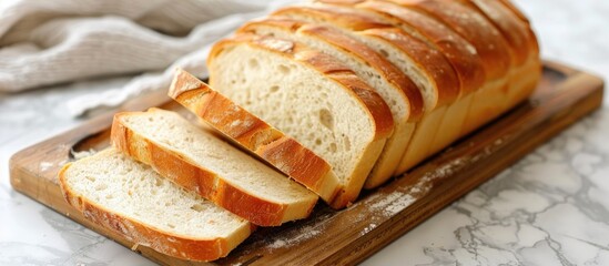 Freshly Baked Sourdough Bread Sliced On Cutting Board