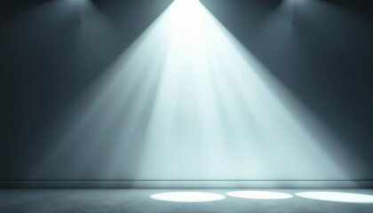 Three spotlights shine on a blank wall.