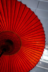 Red umbrellas and architecture in Japan.