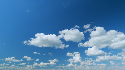 Summer blue sky and white clouds background. Layers of cloud space. Blue sky fluffy white clouds on...