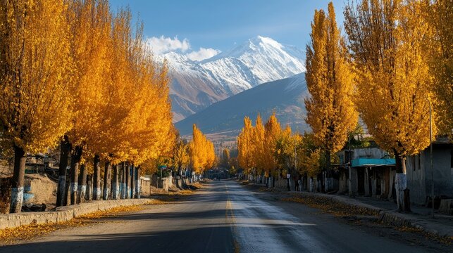 Autumn in Kashmir, with golden Chinar trees lining the streets, and snow-capped peaks visible beyond the horizon.