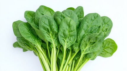 Obraz premium Fresh spinach leaves stacked together, showcasing vibrant green colors, perfect for salads and healthy dishes.