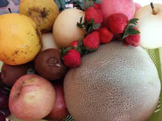 various types of fresh fruit in a basket