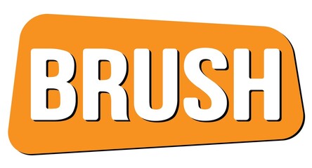 BRUSH text on orange trapeze stamp sign.