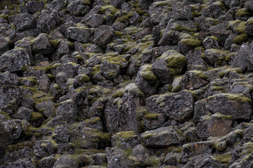 basaltic stone wall covered with moss, Þingvellir  (Thingvellir) National Park, Iceland