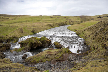 Fototapeta premium Hestavaðsfoss, the first of many waterfalls on the Skógá River above Skógafoss on the Laugavegur trail, South Iceland