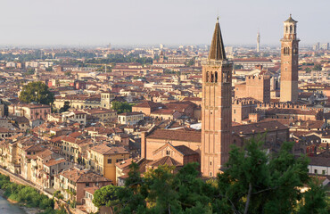 A panoramic view of the old town of Verona, as seen from the observation point Punto Panoramico near San Pietro castle. Verona at the sunrise. Vacation in Italy. Tourist destination.