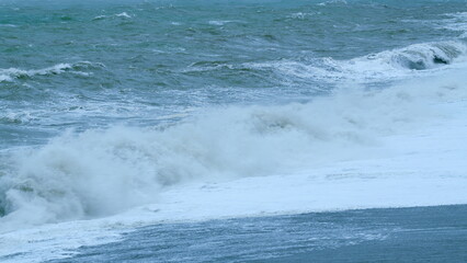 Naklejka premium Stormy Weather On Sea. Crashing Waves With Foamy White Texture. Static.