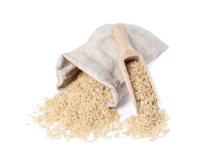 Raw rice in burlap with scoop isolated on white