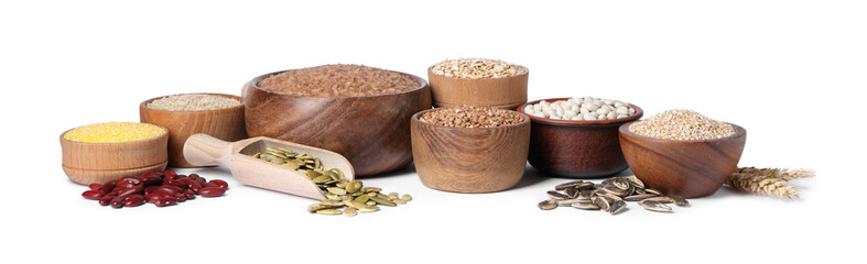 Different types of cereals, legumes and seeds isolated on white