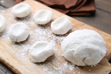 Dough for tasty homemade mochi on wooden table, closeup