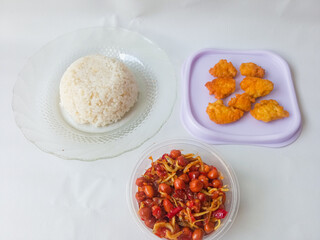 Fried tofu side dish rice isolate on white. balado anchovies and peanuts
