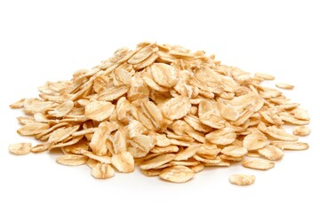 Heap of oat flakes isolated on white background. Healthy breakfast