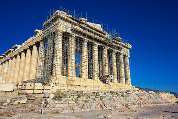 Obraz premium Parthenon temple is an ancient greek temple on the Athenian Acropolis, Greece, that was dedicated to the goddess Athena.