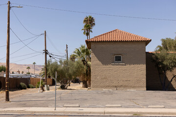 Taft, California, USA - September 20, 2024: Afternoon sunlight shines on buildings in the urban...