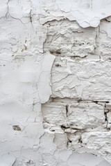 A worn-out brick wall with flaking paint, great for depicting urban decay or abandoned buildings