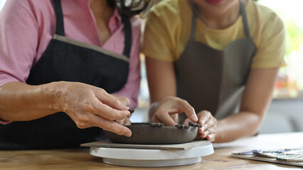 Learning the Craft: A Mother Guidance in Pottery Making