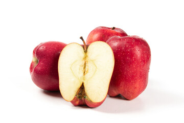 Fresh red apple isolated on white background. delicious  apple cut in half.