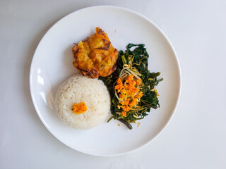 Urap Sayur. healthy and traditional indonesian food isolated on white