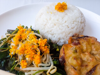 Urap Sayur. healthy and traditional indonesian food isolated on white