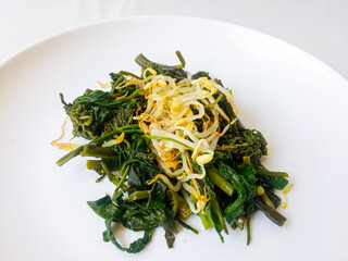 Urap Sayur. healthy and traditional indonesian food isolated on white