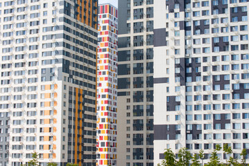 A modern residential quarter with fashionable bright houses. Real estate, new buildings