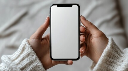 Hands Holding a Smartphone with a Blank Screen
