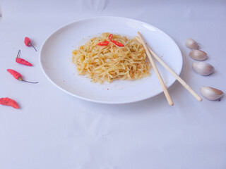 Indomie Rebus Ayam Bawang. Chicken Garlic Soup Instant Noodle Flavour with chili isolate on white
