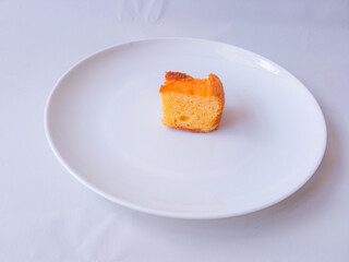 Pieces of tasty lemon cake with  isolated on white