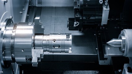 Manufacturing CNC professional lathe machine, Industrial concept.
