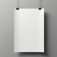 A blank white poster mockup  hanging black clips against Soft grey  background 