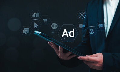 Online marketing and advertising internet concept. Businessman using tablet brainstorming, planning, strategy for future business promotion on websites and social media for traffic and awareness.