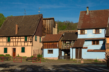 Picturesque landscape view of colorful ancient houses in Riquewihr village, France. The Riesling and other wines produced in this village. Famous touristic place and romantic travel destination