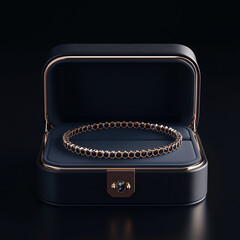 A black box with a gold banded bracelet inside 