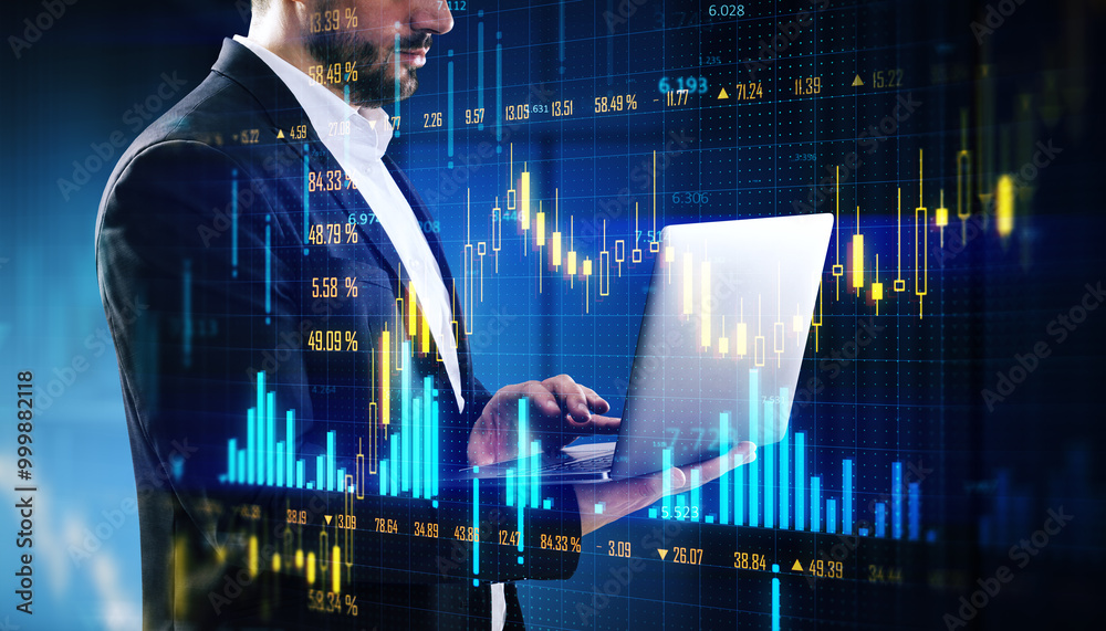 Poster businessman analyzing forex data on laptop with digital financial graphs overlay on dark background.
