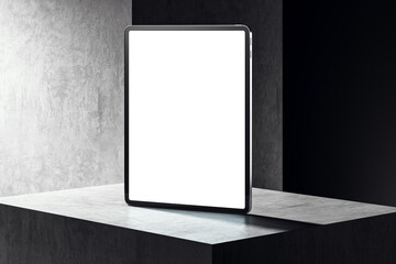 Blank tablet screen mockup standing on a grey and black concrete pedestal. 3D Rendering