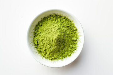 A tall glass of vibrant green matcha smoothie, topped with a sprinkle of matcha powder and garnished with fresh mint leaves. The texture is creamy, with condensation on the glass, on white background