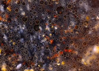 Colorful surface of drops in oil.