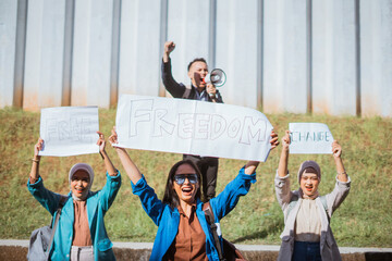 A dedicated group of individuals fervently advocating for the cause of freedom and justice