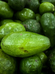 Fresh Organic Avocados Piled for Sale at Local Market